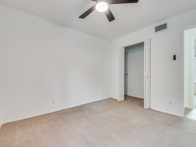 300 Crockett St Unit 103, Austin, TX 78704 - empty room with light carpet, ceiling fan, and baseboards
