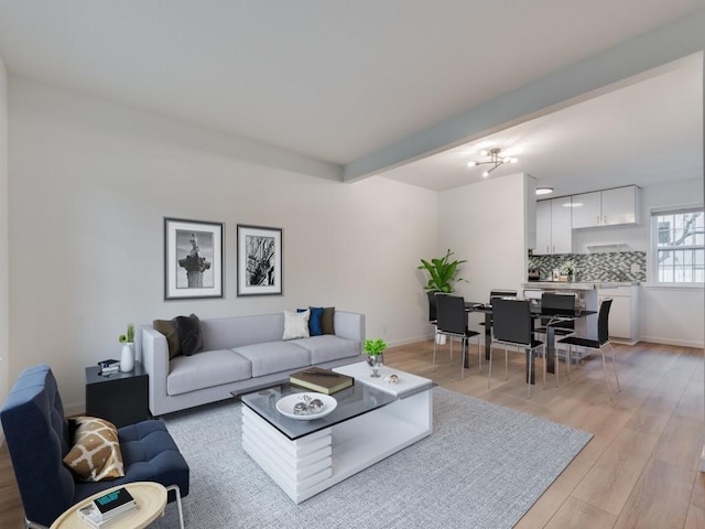 300 Crockett St Unit 103, Austin, TX 78704 - living room featuring light wood-type flooring and baseboards
