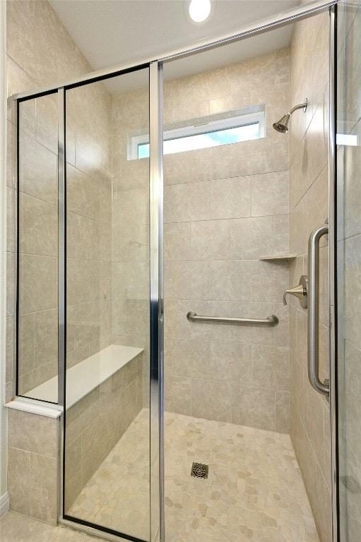 bathroom with an enclosed shower