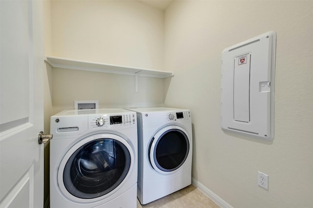 laundry area with independent washer and dryer