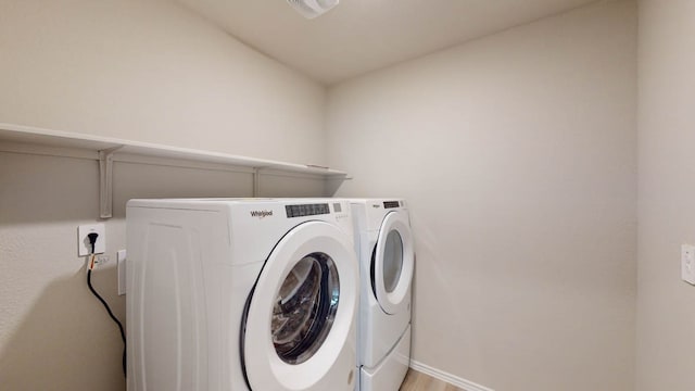 laundry area with washer and dryer