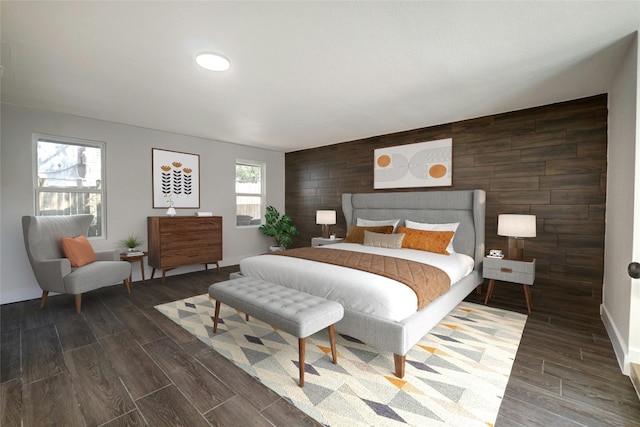 bedroom featuring wood walls and dark hardwood / wood-style flooring