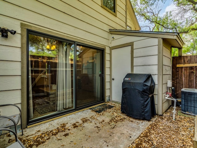 doorway to property with central AC