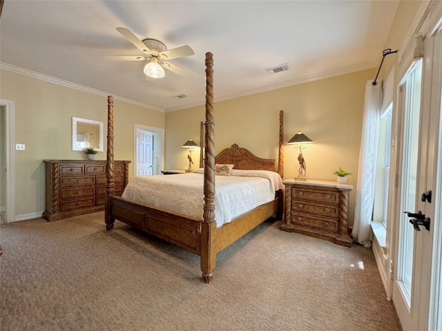 carpeted bedroom with ornamental molding, ceiling fan, and multiple windows