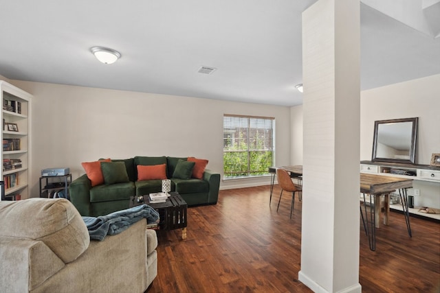 living room with dark hardwood / wood-style floors