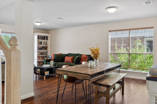 17200 Village Glen Rd, Pflugerville, TX 78660 - dining room with dark wood-style floors and baseboards