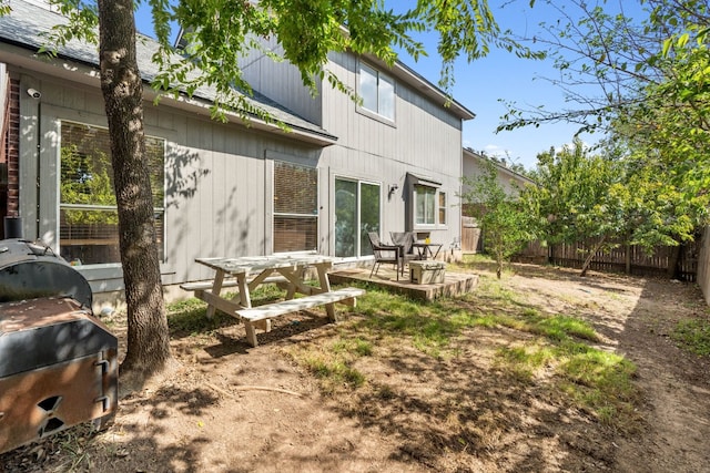 back of property with a patio area