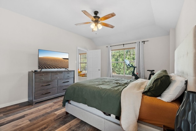 bedroom with dark hardwood / wood-style floors, ceiling fan, and lofted ceiling