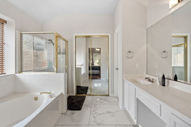 bathroom with vanity and plus walk in shower