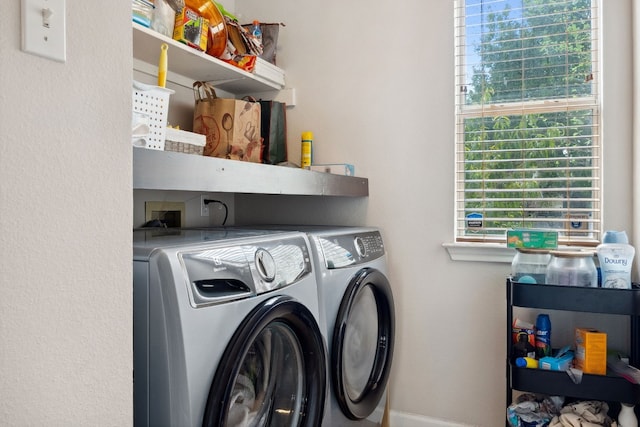 washroom with washer and clothes dryer