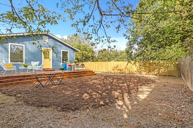 rear view of property with a deck