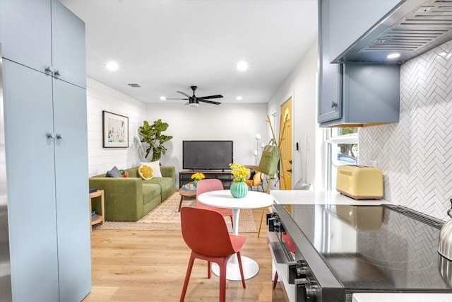 interior space featuring ceiling fan and light hardwood / wood-style flooring