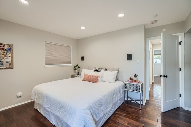 bedroom featuring dark hardwood / wood-style floors