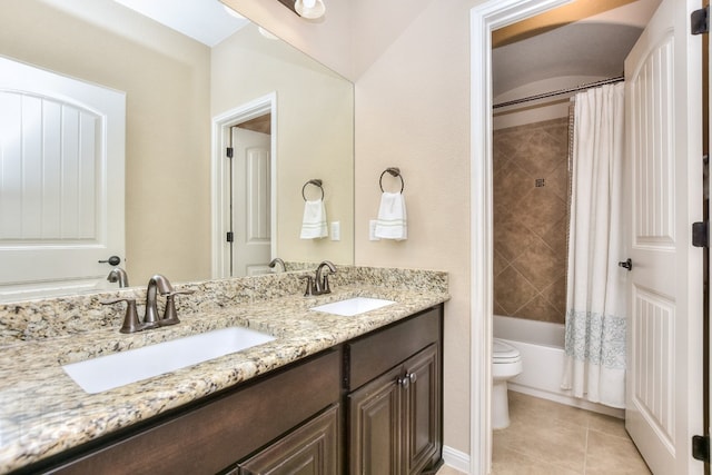 full bathroom with shower / bathtub combination with curtain, toilet, vanity, and tile patterned floors