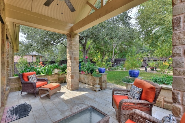 view of patio / terrace with ceiling fan and outdoor lounge area