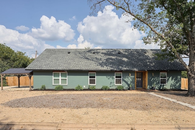 view of front of property with a carport