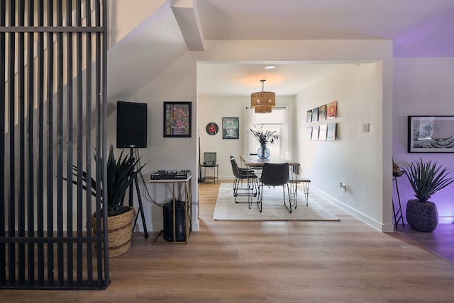 dining area with hardwood / wood-style floors