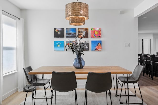 dining room with light wood-type flooring