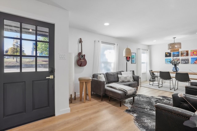 living room featuring light hardwood / wood-style floors and plenty of natural light