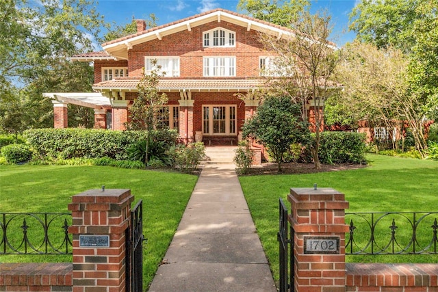 view of front of property with a front lawn