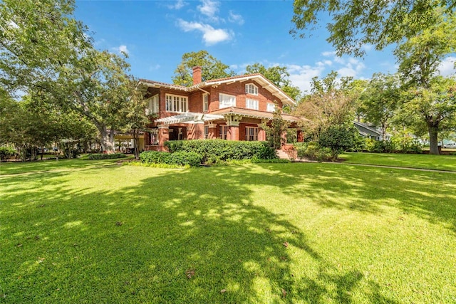 view of front of home with a front yard