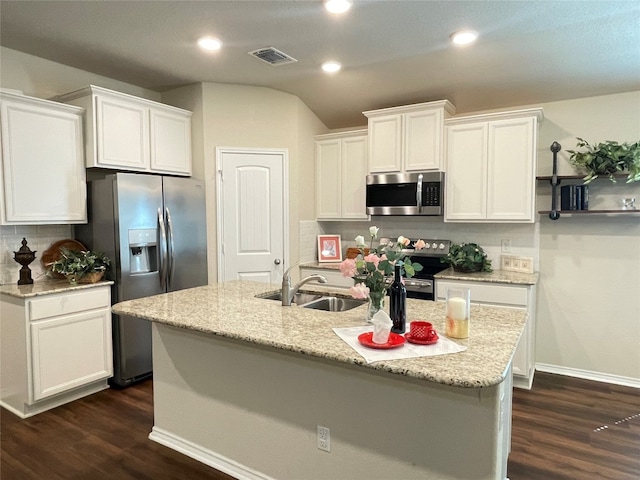 kitchen featuring white cabinetry, sink, an island with sink, and stainless steel appliances