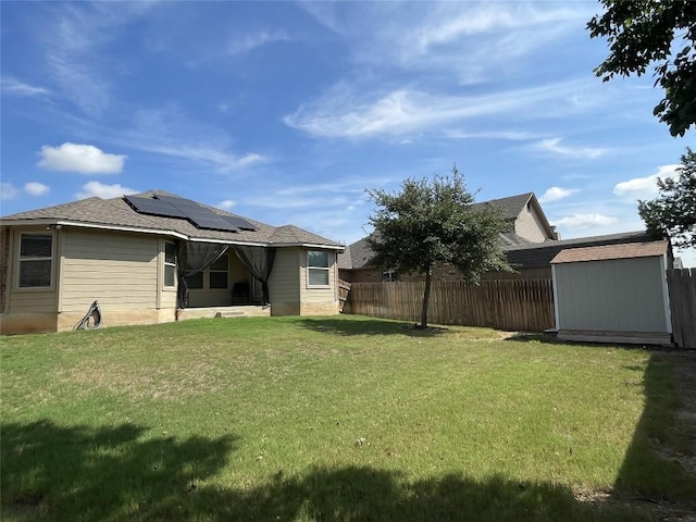 view of yard with a storage unit