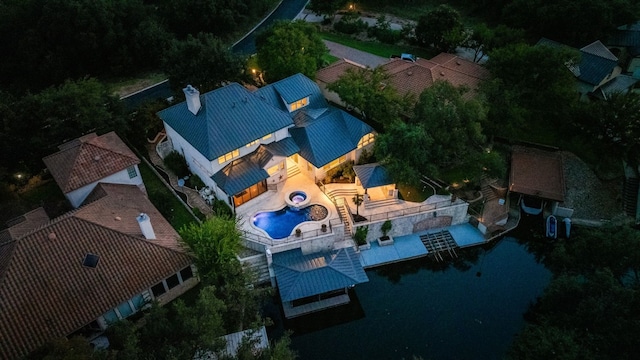 3605 Douglas Dr, Horseshoe Bay, TX 78657 - aerial view of property and surrounding area featuring a pool