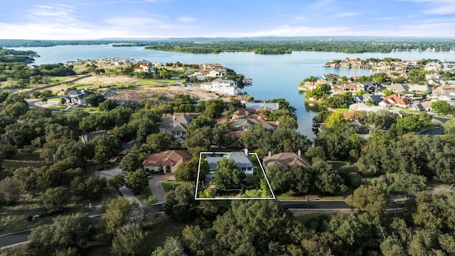 3605 Douglas Dr, Horseshoe Bay, TX 78657 - aerial perspective of suburban area featuring property parcel outlined and a nearby body of water