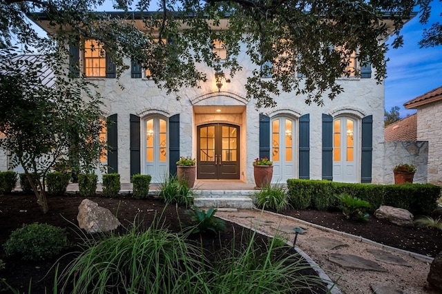 view of front facade featuring french doors