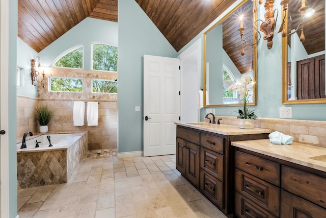 bathroom featuring wood ceiling, tiled bath, vanity, and plenty of natural light