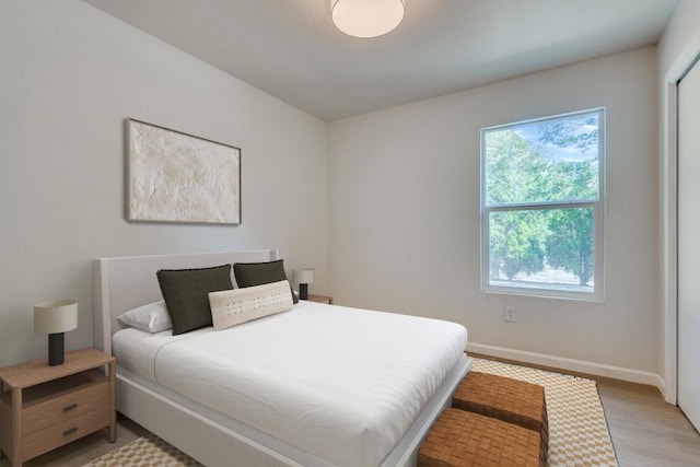 bedroom featuring light wood-type flooring