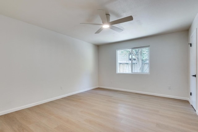 unfurnished room with light hardwood / wood-style floors and ceiling fan