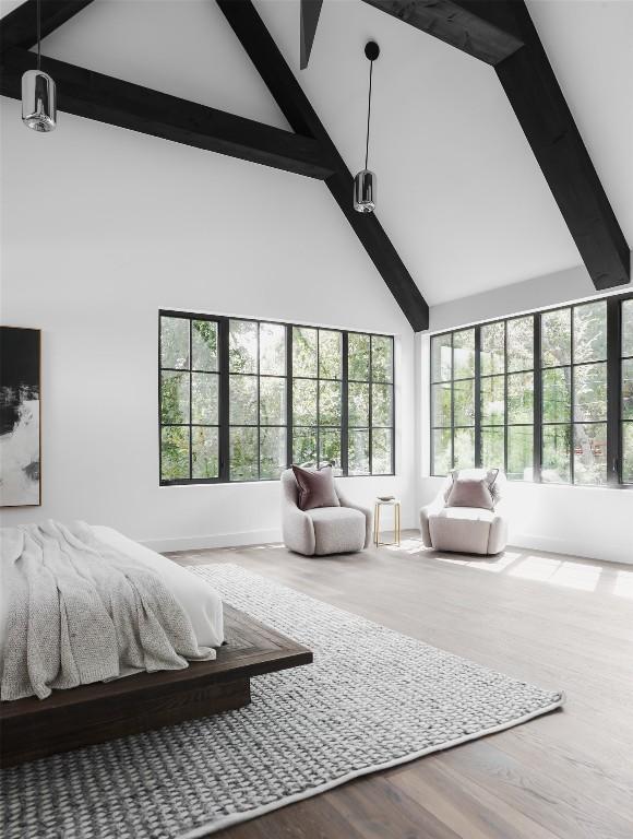 2905 Oak Park Dr, Austin, TX 78704 - bedroom with beamed ceiling, high vaulted ceiling, and wood finished floors