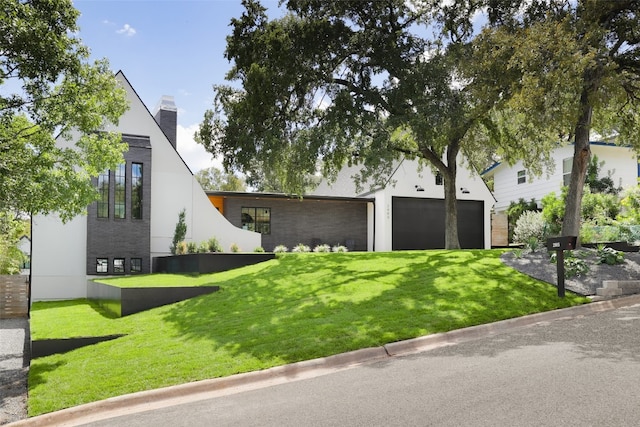 view of front of property with a front lawn