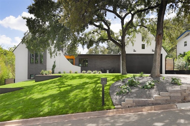 2905 Oak Park Dr, Austin, TX 78704 - modern home with stucco siding and a front lawn