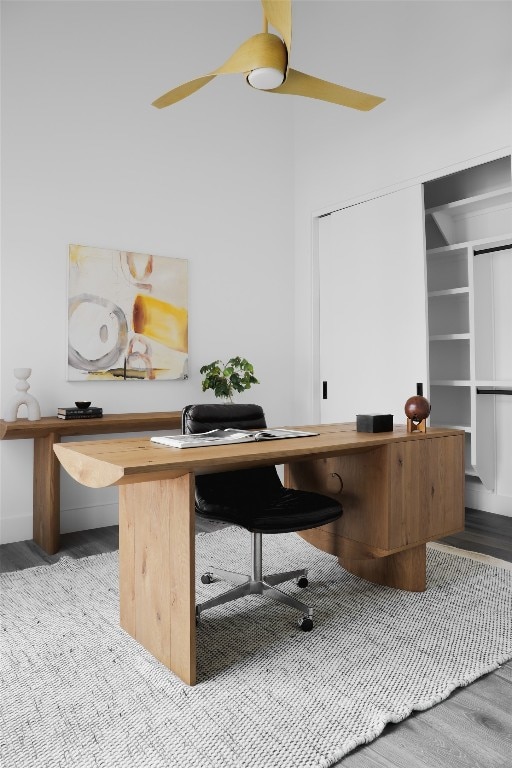 office space featuring ceiling fan and light hardwood / wood-style flooring