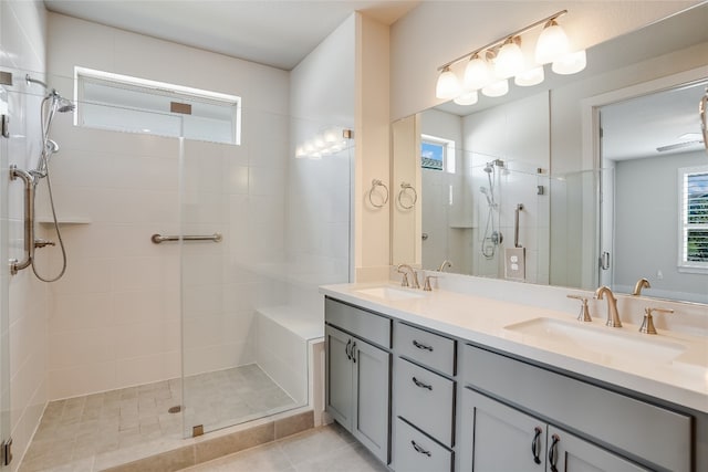 bathroom with vanity, tile patterned floors, and an enclosed shower