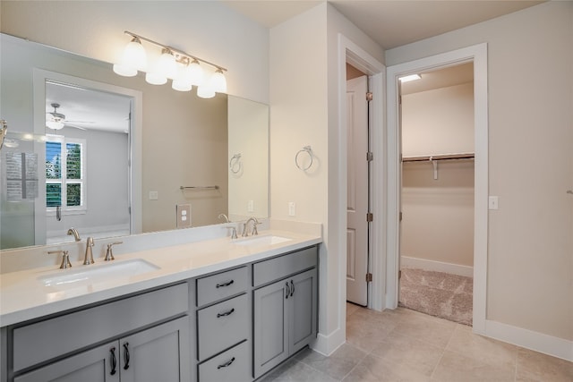 bathroom with vanity, ceiling fan, and tile patterned floors