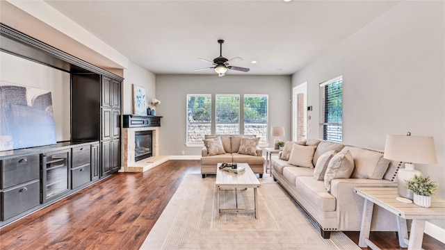 living room with hardwood / wood-style flooring and ceiling fan