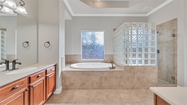 bathroom featuring crown molding, tile patterned flooring, and vanity