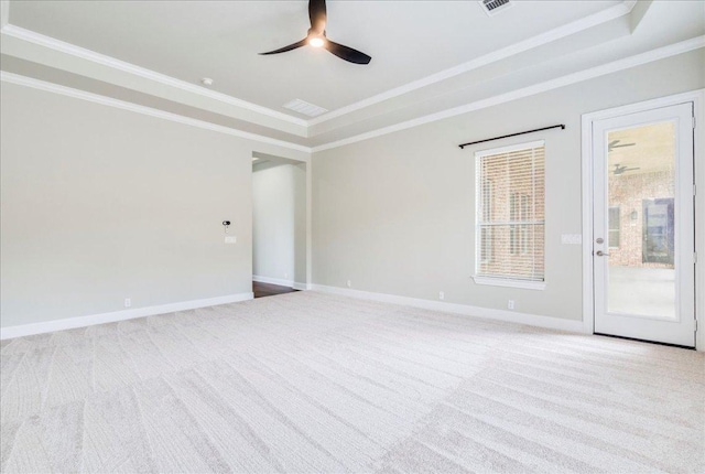 175 Blazing Star Dr, Austin, TX 78737 - carpeted spare room featuring a raised ceiling, crown molding, and a ceiling fan