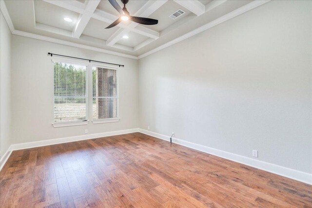 175 Blazing Star Dr, Austin, TX 78737 - spare room featuring coffered ceiling, beam ceiling, wood finished floors, a ceiling fan, and recessed lighting