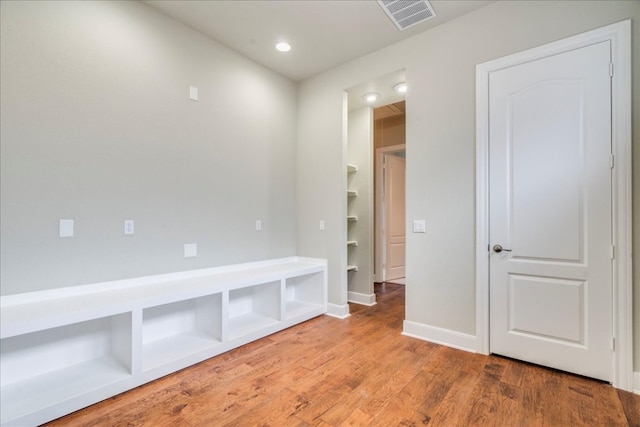 175 Blazing Star Dr, Austin, TX 78737 - mudroom with wood finished floors and recessed lighting
