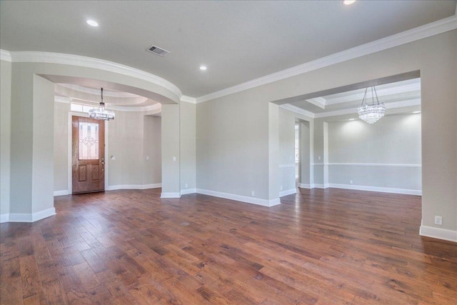 175 Blazing Star Dr, Austin, TX 78737 - unfurnished room with a chandelier, wood finished floors, ornamental molding, arched walkways, and recessed lighting