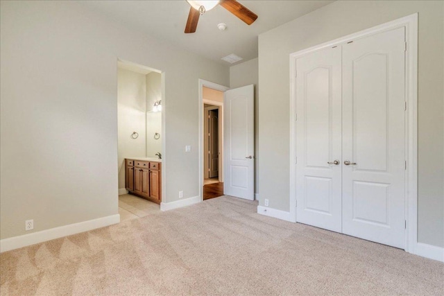 175 Blazing Star Dr, Austin, TX 78737 - unfurnished bedroom with light colored carpet, a closet, ensuite bath, and ceiling fan