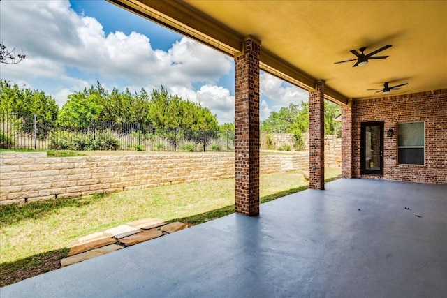 175 Blazing Star Dr, Austin, TX 78737 - fenced backyard featuring a ceiling fan and a patio area