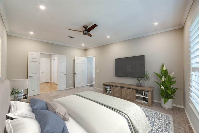 carpeted bedroom with crown molding and ceiling fan