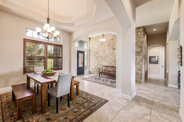 dining area featuring a chandelier