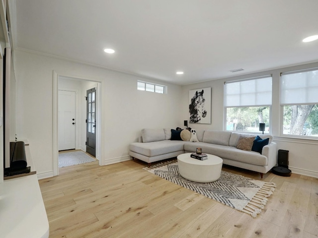 living room with light hardwood / wood-style floors